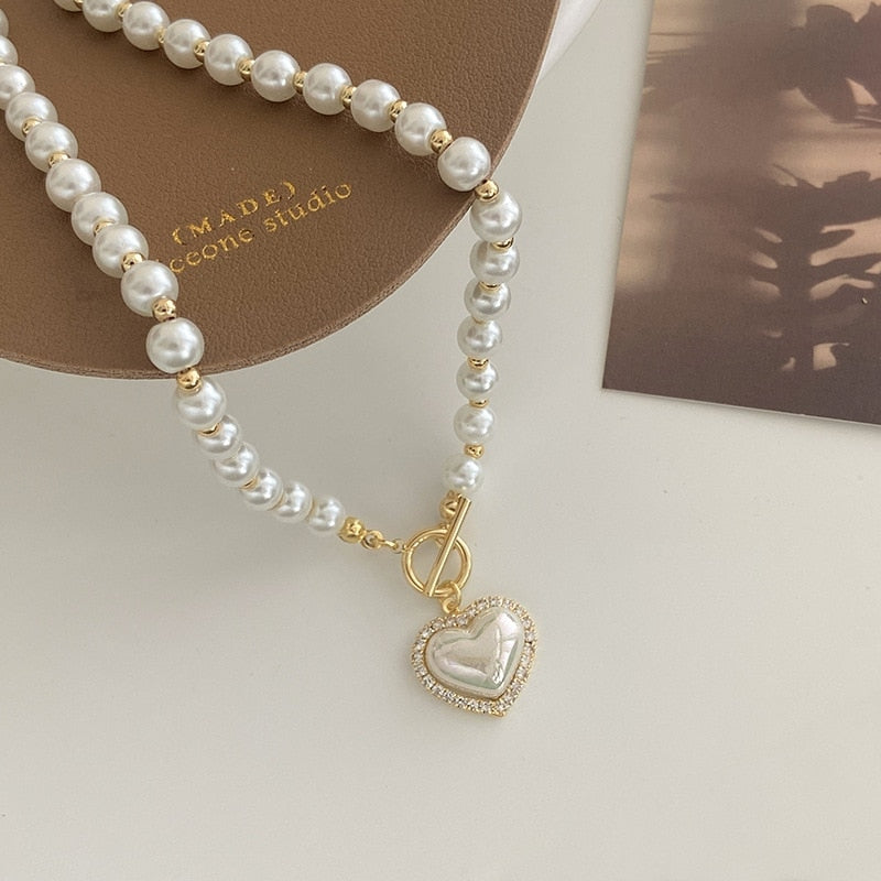 Colar de pérolas com pingente de coração dourado – joia romântica Donna You