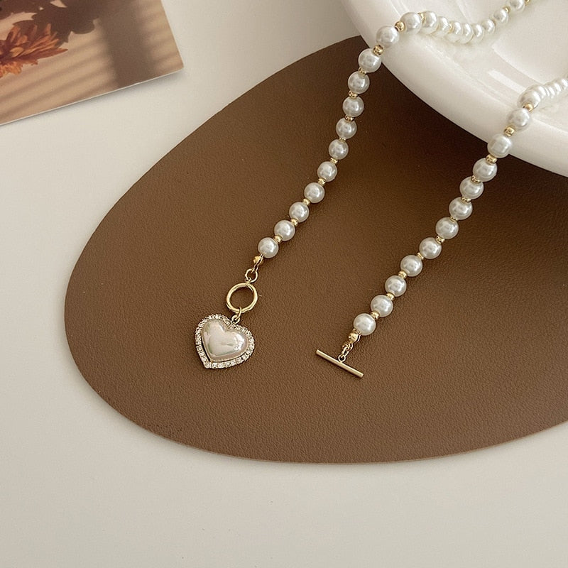Colar de pérolas com pingente de coração dourado – joia romântica Donna You