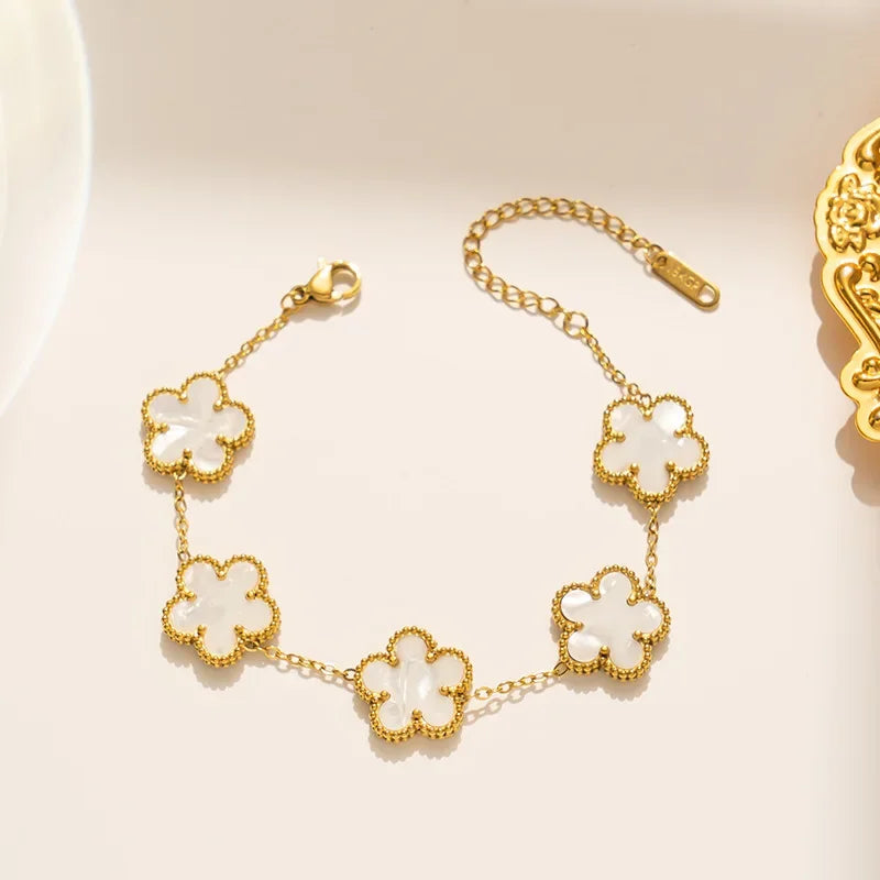 pulseira Virginia donna you feminino com cinco trevos dourados dupla face