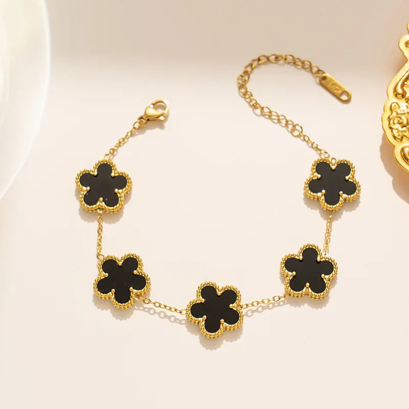 pulseira Virginia donna you feminino com cinco trevos dourados dupla face