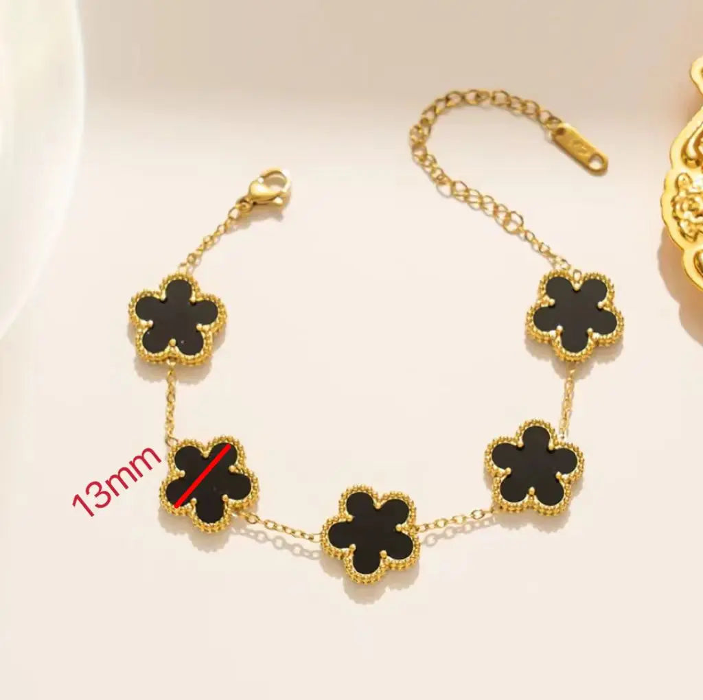 pulseira Virginia donna you feminino com cinco trevos dourados dupla face