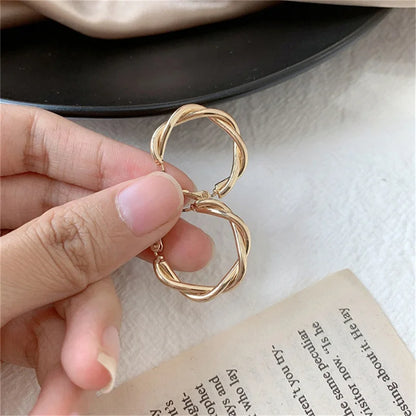 BRINCO ARGOLA TRANÇADA BANHADO A OURO 18K