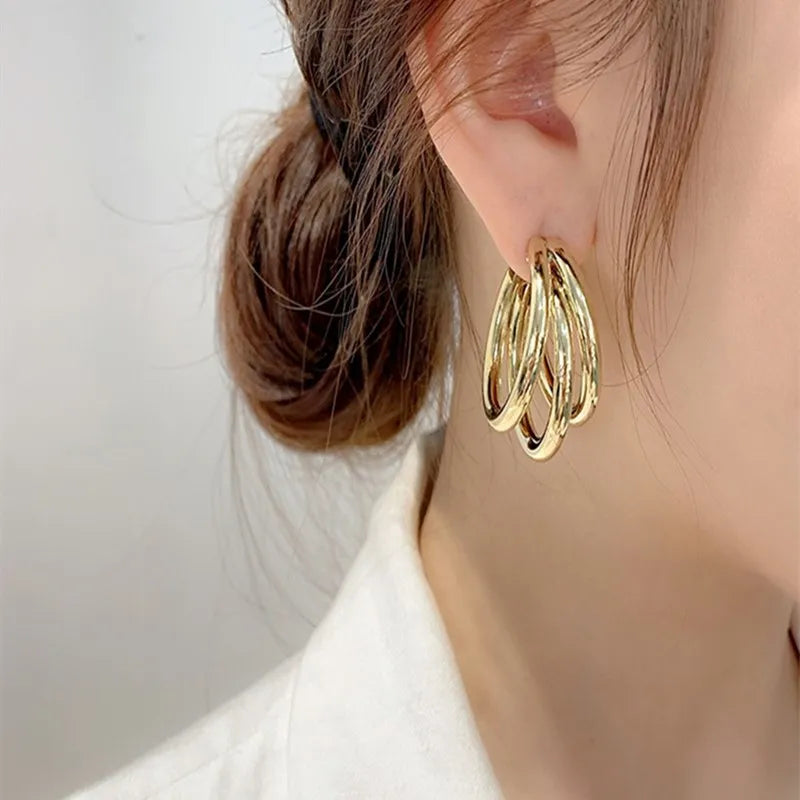 BRINCO TRIGEMEAS BANHADO A OURO 18K