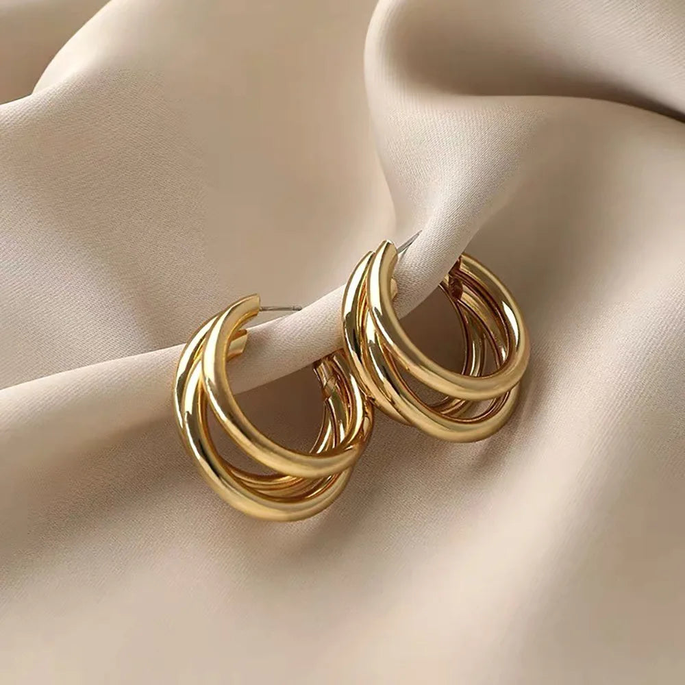 BRINCO TRIGEMEAS BANHADO A OURO 18K