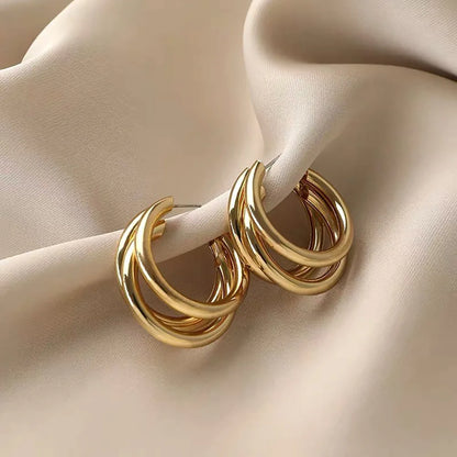 BRINCO TRIGEMEAS BANHADO A OURO 18K